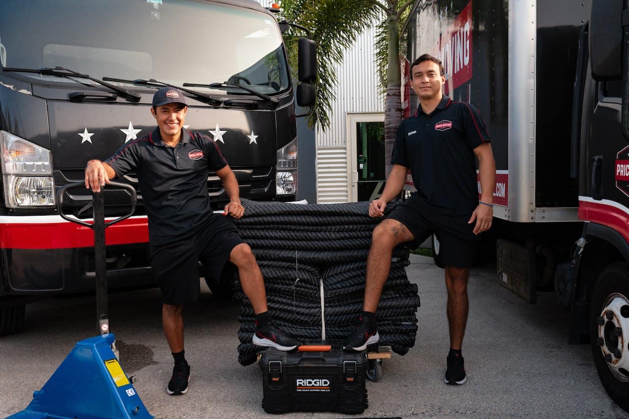 Movers preparing materials for a job