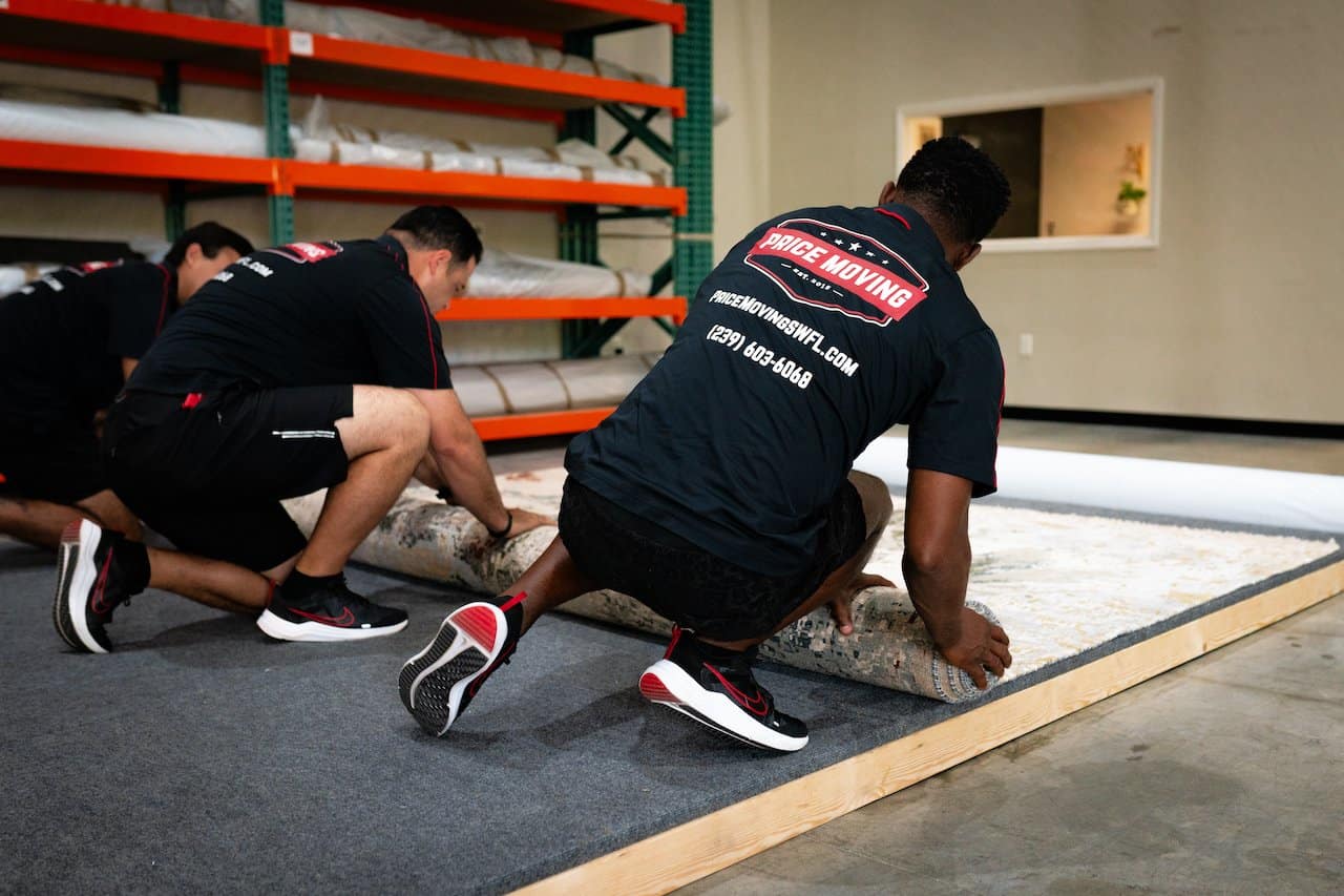 Movers carefully working on a delicate relocation