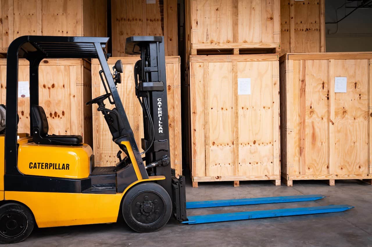 Caterpillar forklift parked at warehouse